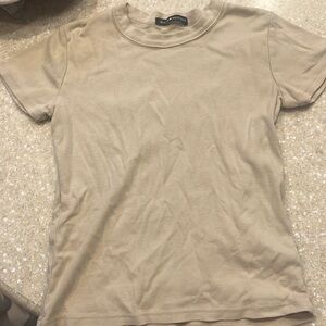 Creame brandy melville fitted baby tee. Size: one size